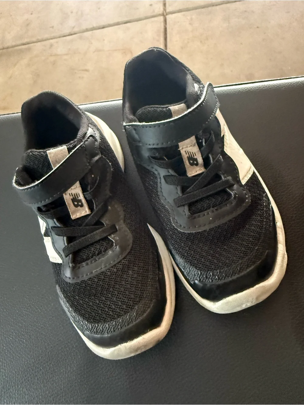 New Balance Kids Black and White Velcro Sneakers